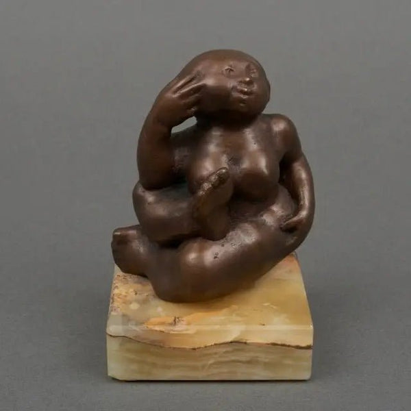 Rudolf Schweiger - Eva brown patinated bronze sculpture of a naked woman, dated 1973, on natural stone base, 15 × 9 × 9 cm.