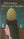 Dolf Zwerver, Veiled with Egg, 1976. Oil on board painting depicting a veiled woman with an egg in a nest, picture of the book belcampo