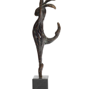Side of bronze statue of a dancing hare with a ball in his hand