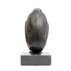 Crouching Figure by Theo Germann, 1984, back view with the head facing right, mounted on a hardstone base.
