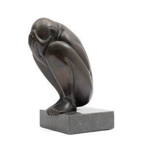 Crouching Figure by Theo Germann, 1984, bronze sculpture with drawn-up knees and hands covering the face, side view.