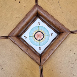 A very rare square wooden storage table - Topside, in the middle the image of a compass, - Vittorio Lombardi, Milan, Italy ca.1950.