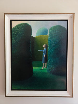 Dolf Zwerver, Woman in a Garden (1988), oil on panel depicting a woman in a blue dress standing between tall green hedges in an enclosed garden with frame