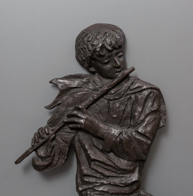 Kunstwerk van Margot Hudig-Heldring: Fluitspelende jongen, brons