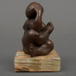 Rudolf Schwaiger | “Eva” | Brown-patinated bronze sculpture | 15 × 9 × 9 cm | 1973 | Natural stone base | Signed | side side view